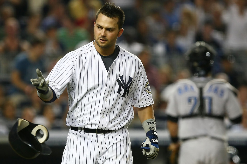 Yankees' Nick Swisher: Constant losing is in the Twins' heads 