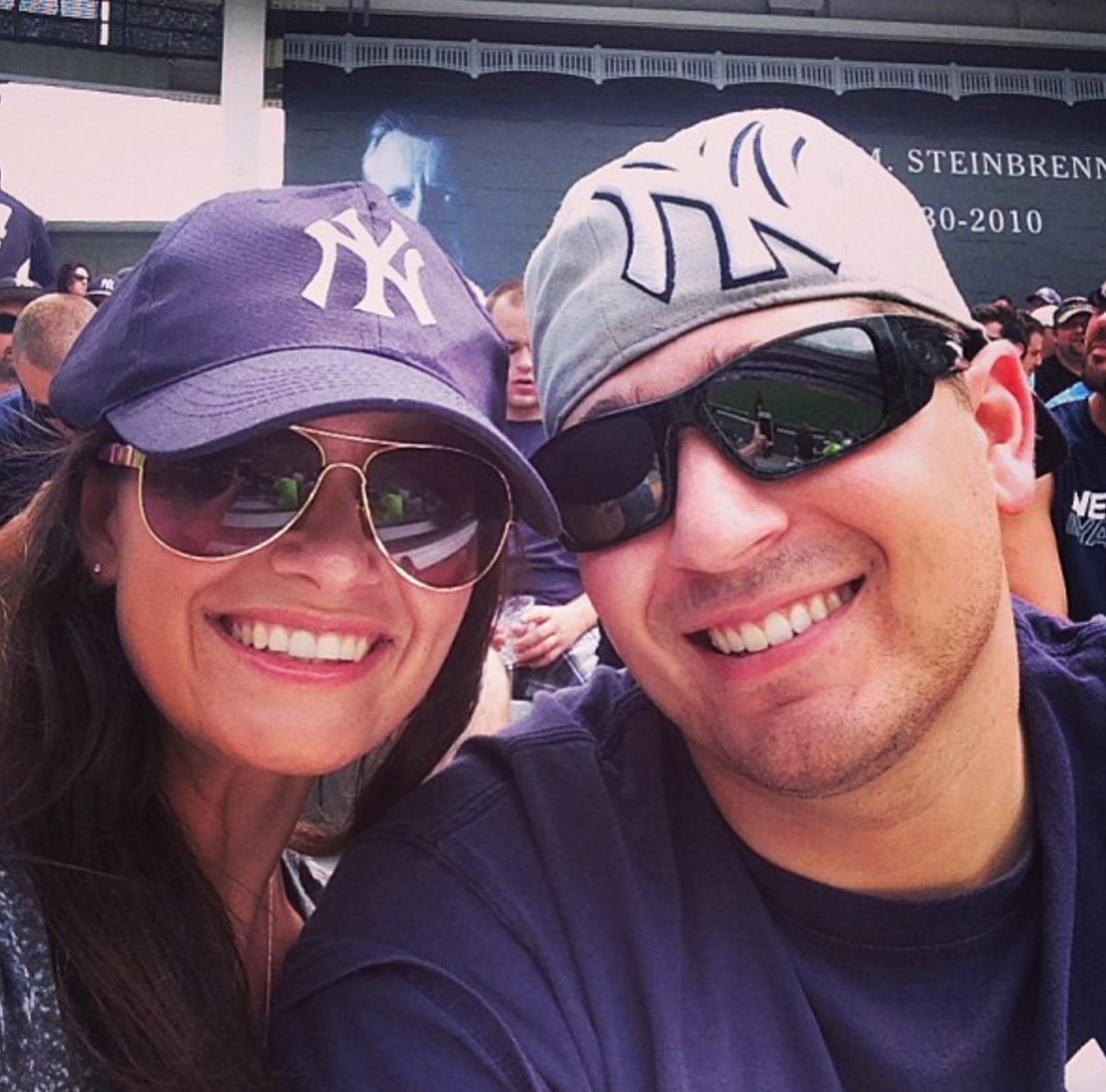My wife and I taking in a Yanks game 