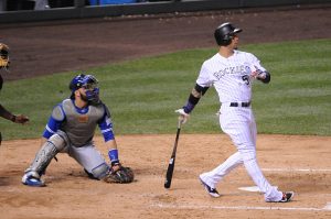 DENVER, CO - JUNE 28:  Carlos Gonzalez #5 of the Colorado Rockies hits a three run home run in the fourth inning against the Toronto Blue Jays at Coors Field on June 28, 2016 in Denver, Colorado.  The Toronto Blue Jays defeat the Colorado Rockies 14-9. (Photo by Bart Young/Getty Images)