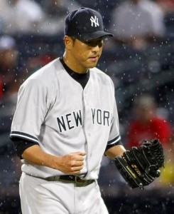 New York Yankees' Kuroda reacts after striking out Atlanta Braves' Bourn in their MLB interleague baseball game at Atlanta